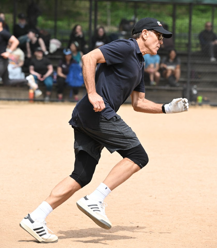 George Clooney playing softball in Central Park.