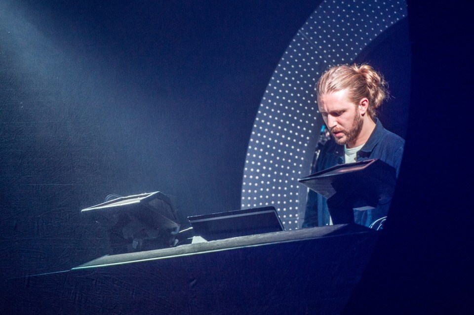 Sub Focus performing on stage at Brixton Academy.