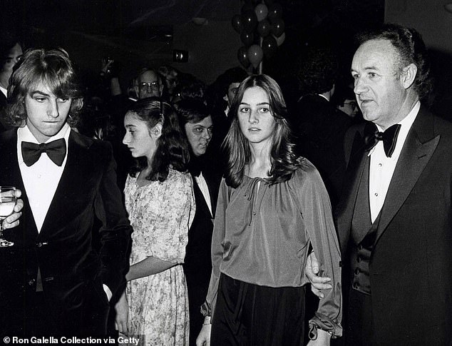 Hackman's three children are pictured with him during the 1978 premiere of Superman