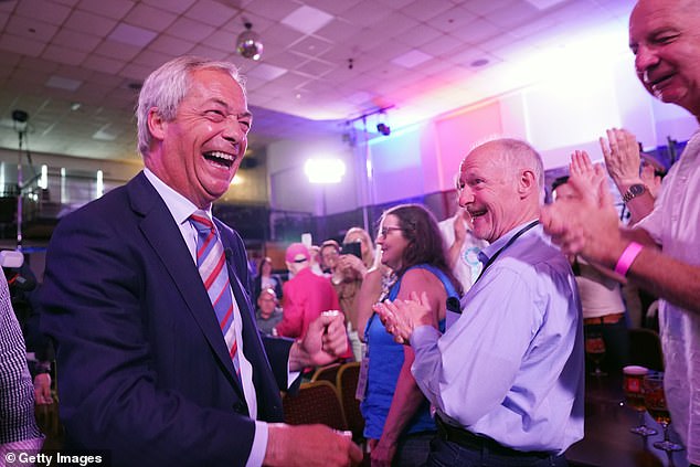 Pictured: Reform UK party leader Nigel Farage is seen celebrating with supporters after Reform UK took control of Durham County Council
