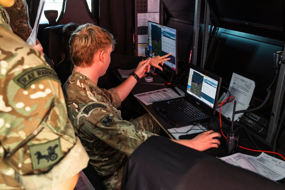 RAF and Royal Navy personnel operating a StormShroud drone control system.