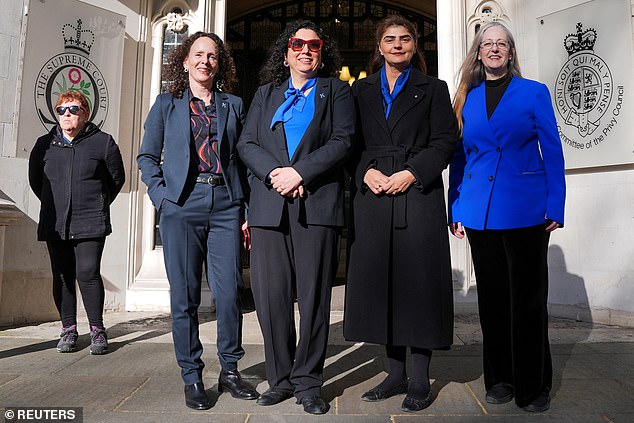 Fiona McAnena, Maya Forstater, Pam Ghosal and Helen Joyce stand outside the supreme court on the day of the ruling