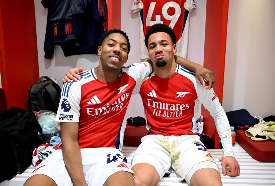 Myles Lewis-Skelly and Ethan Nwaneri of Arsenal F.C. in the team locker room.