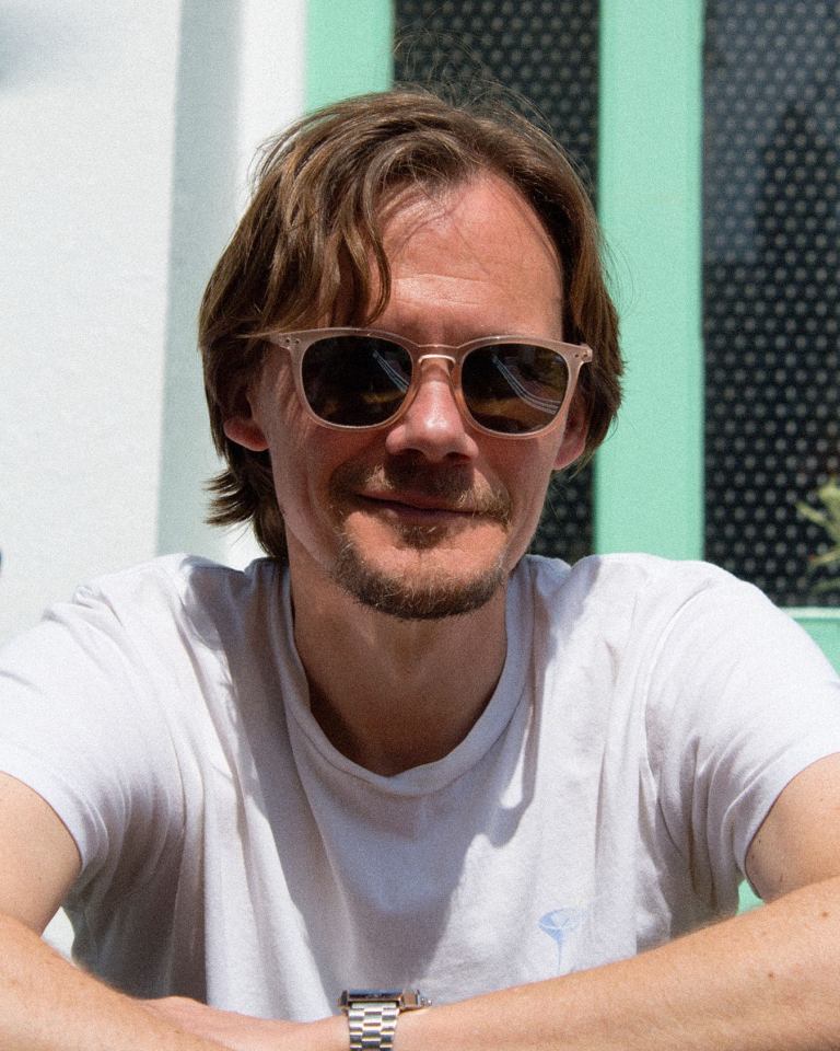 Portrait of Just Jack wearing sunglasses.