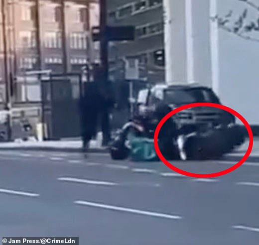 Footage shows how the courier was parked on a road in Birmingham before he was ambushed by four thieves