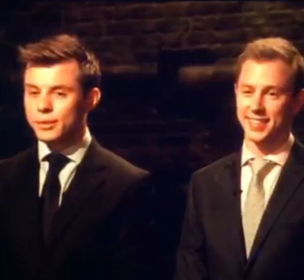Two men in suits.