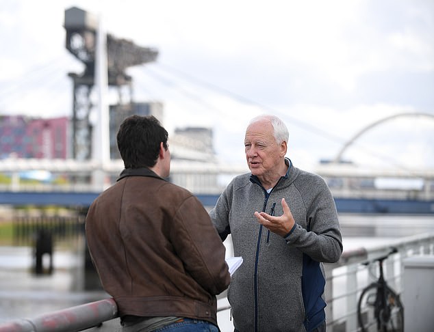 He told MailOnline reporter Chris Matthews (left) the gangs were not 'hierarchy' but 'an all-encompassing spread'