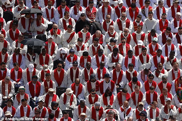 Priests attend the funeral service of Pope Francis in St. Peter's Square