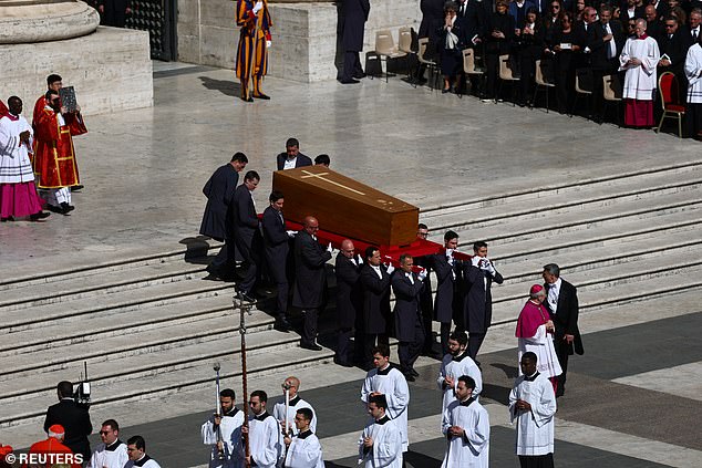 Prisoners and migrants will later usher the late pontiff into the basilica where he will be buried, reflecting his priorities as pope