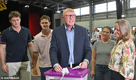 Leader of the Opposition Peter Dutton casts his ballot with his family at the Albany Creek State School in Albany Creek, Brisbane on day 36 of his 2025 Federal Election Campaign in the seat of Gorton, Saturday, May 3, 2025. (AAP Image/Mick Tsikas) NO ARCHIVING