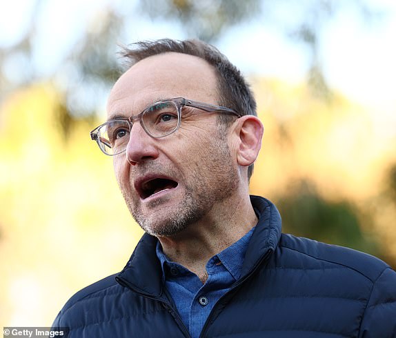 MELBOURNE, AUSTRALIA - MAY 03: Adam Bandt, leader of the Greens speaks to media in the seat of Wills at Brunswick East Primary School on May 03, 2025 in Melbourne, Australia. Australians headed to the polls on Saturday for the 2025 federal election, where all 150 seats in the House of Representatives and 40 of 76 Senate seats are up for grabs. This election is especially consequential due to a tightly contested race, with cost-of-living pressures, affordable housing, and energy policy dominating the campaign. Though most polls indicate a narrow Labor victory against the Liberal-National coalition, the result could also lead to a hung parliament, reflecting the growing influence of independents and minor parties, and potentially reshaping the balance of power in Australia in the years ahead. (Photo by Morgan Hancock/Getty Images)