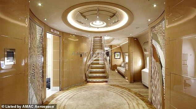 A glimmering corridor inside the plane that jives with Trump's famous love for anything and everything gold