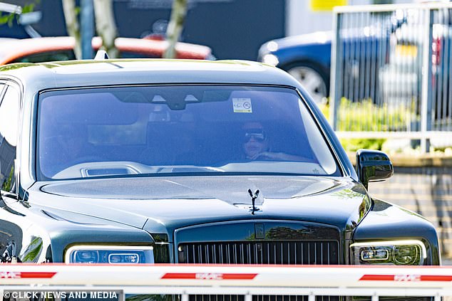 Victoria was seen through the window as the couple prepared to drive home
