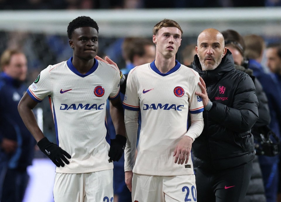 Chelsea's Cole Palmer, Tyrique George, and manager Enzo Maresca celebrating after a match.