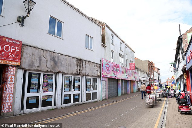 Many local businesses have been forced to close their shutters which locals say adds to the 'run-down' look of the town centre