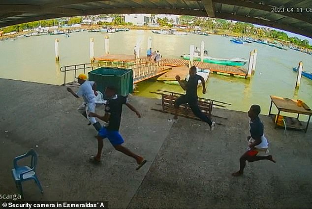 CCTV video footage in Esmeraldas' Artisanal Fishing Port showing people running after armed men fired on the port in Esmeraldas, Ecuador on April 11, 2023