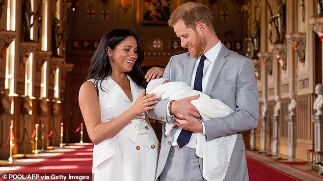 'The people I feel really sorry for in all this are the Sussex children. I wonder what they will make of all this when they realise they have been denied their birthright and the love of their wider family because of the actions of their own father.' Pictures: Meghan and Harry with baby Archie in 2019.
