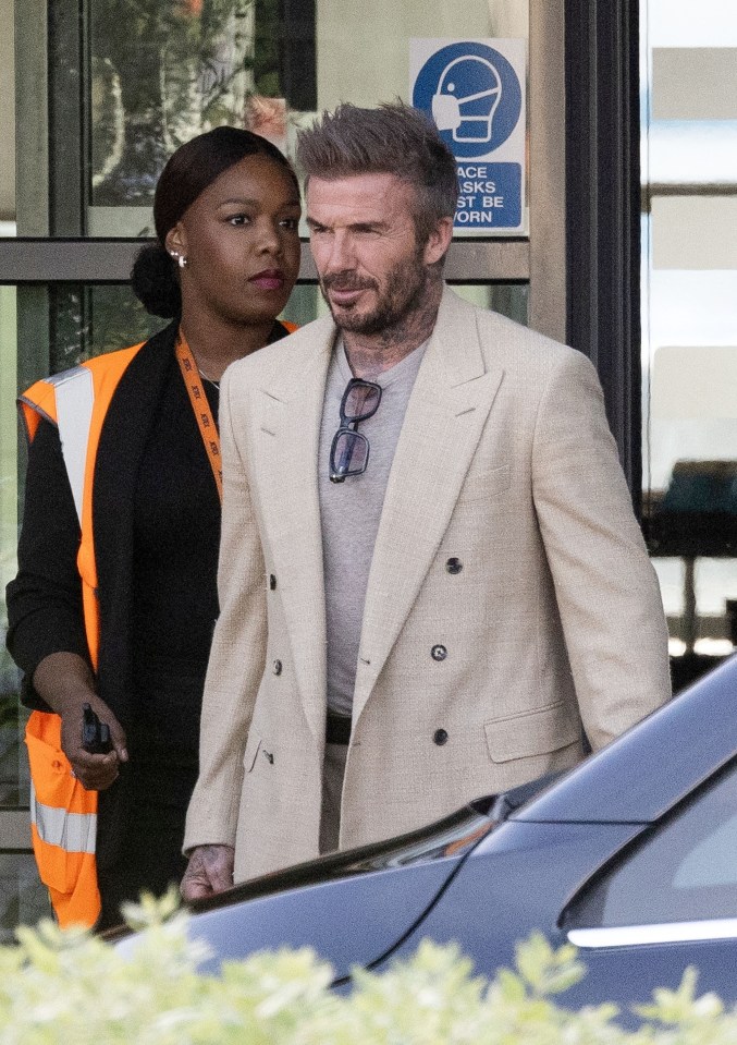 David Beckham arriving at an airport.