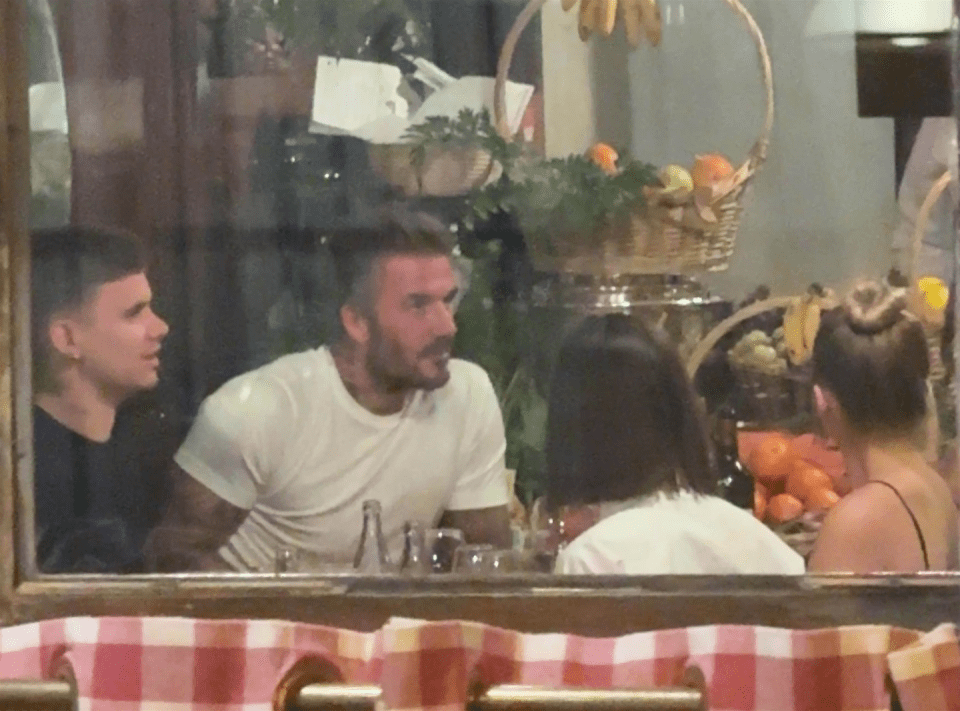David Beckham dining with friends.