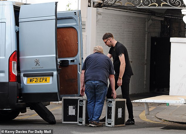 Music equipment was seen being carried into the venue