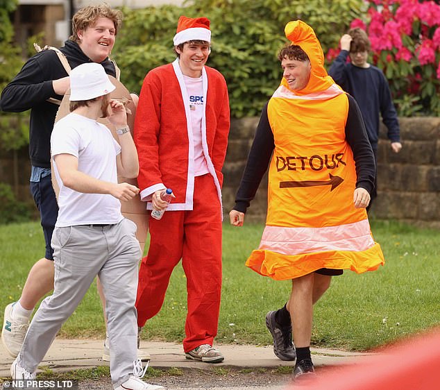 Images showed drinkers dressed up as traffic cones, Smurfs and even Doctor Who characters as they attended the drinkathon today