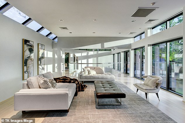 The home's distinctive angular design also is fitting for the new owner's artistic vision