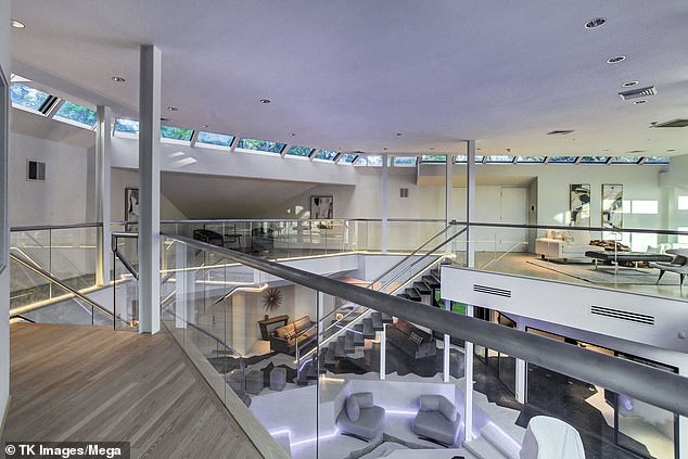 The home's distinctive angular design also is fitting for the new owner's artistic vision