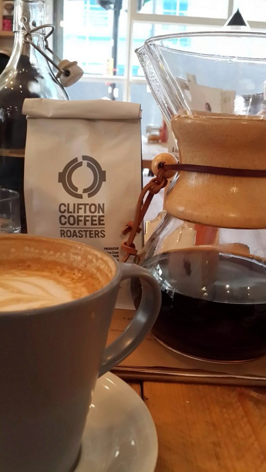 A latte and pour-over coffee at Clifton Coffee Roasters.