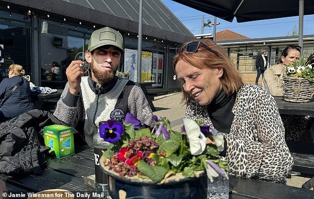 A 23 year old Kurdish migrant (no name) who arrived in Denmark as an unaccompanied minor, pictured speaking to Sue Reid