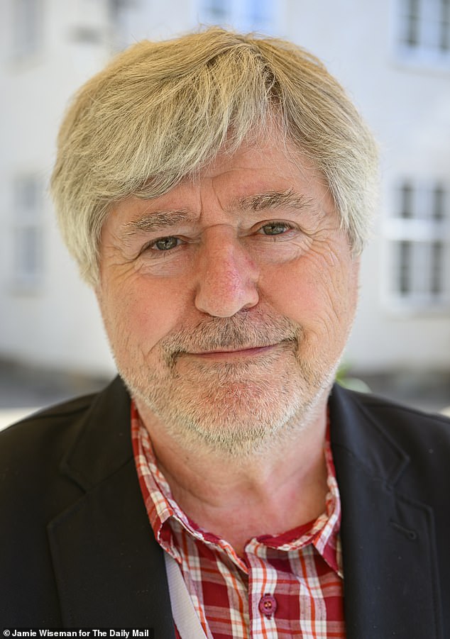 Former MEP Soren Sondergard, a Left-wing immigration expert pictured after talking to Sue
