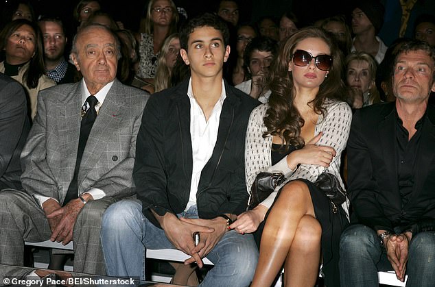 Omar, centre, with his father Mohamed and sister Camilla at a fashion show in New York