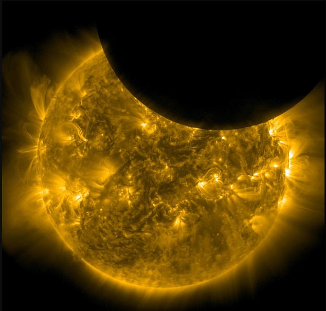 The video captured the moon as a dark spot in the frame, moving in front of the fiery sun