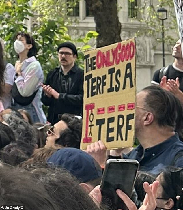 One sign at the protest in London's Parliament Square showed an illustration of hangman alongside the slogan 'The only good TERF is a [hanged] TERF'