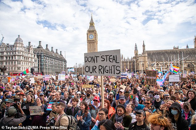 The Equalities and Human Rights Commission (EHRC) issued itsguidance to charities and public sector organisations following the Supreme Court's ruling that trans women ¿ men who identify as female ¿ are not women under the law. Pictured: Protesters gathered in support of transgender rights following the ruling