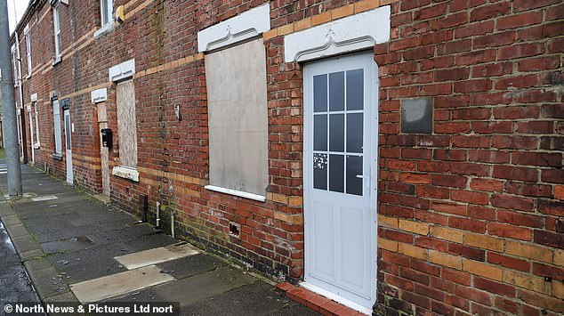 One home in the village of Horden in County Durham had a fake door plastered on its frontage alongside a boarded up window to fool criminals into thinking it was lived in
