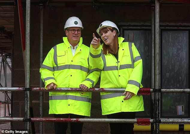 Ms Rayner (pictured in Cambridgeshire with Keir Starmer in December) is trying to build 1.5million homes to help with the housing crisis