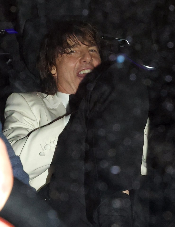Tom Cruise leaving a restaurant in London.