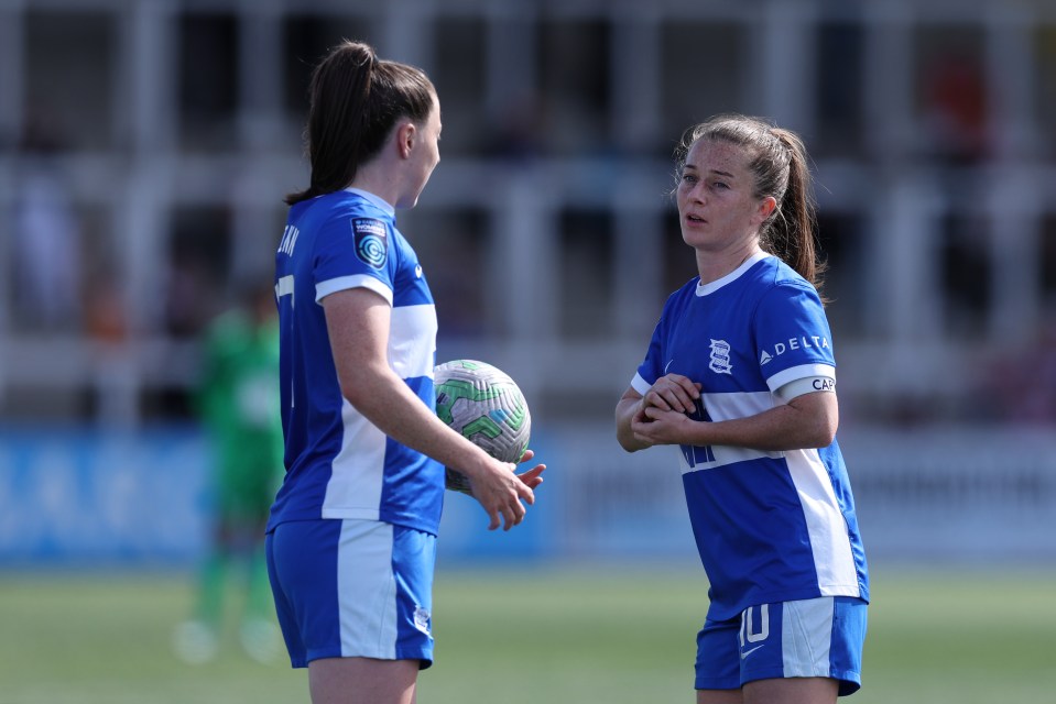 Christie Harrison-Murray of Birmingham City and Lucy Quinn during a soccer match.