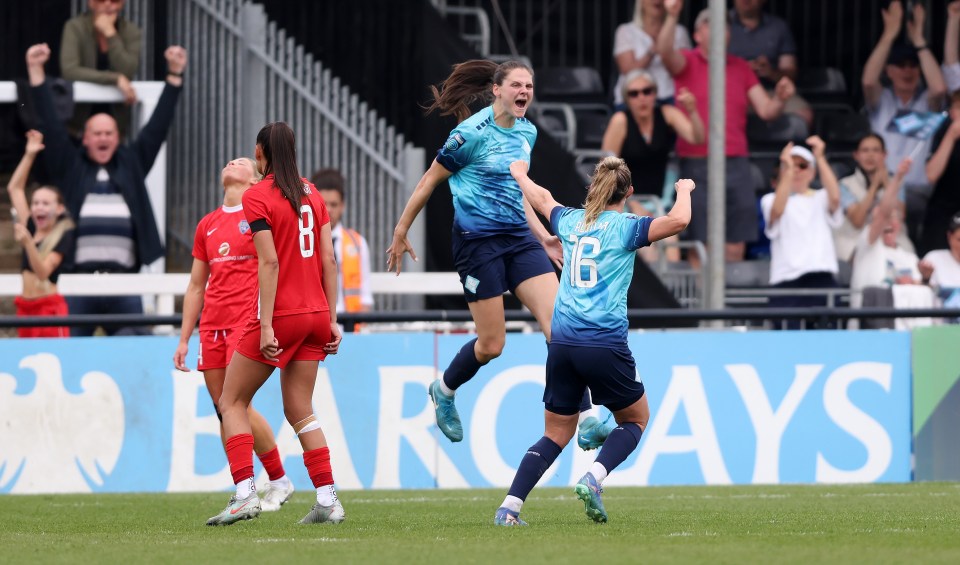 Isobel Goodwin of London City Lionesses celebrates scoring a goal.