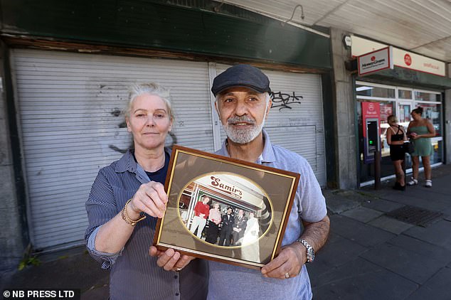 Clutching a photograph of the business her family once owned, Helen Zalam, 61, said Samir's was once the pride of Freeman Street (Pictured here with her husband)