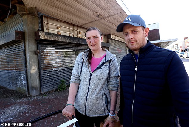 Ben Watson, 37, born and raised in Grimsby, said: 'If you're after fast food or a haircut, you're alright. But there's nothing else'. Mr Watson is pictured here with Kelly Claire