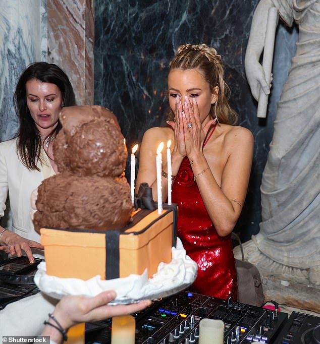 Olivia looked delighted with her Labubu-shaped cake