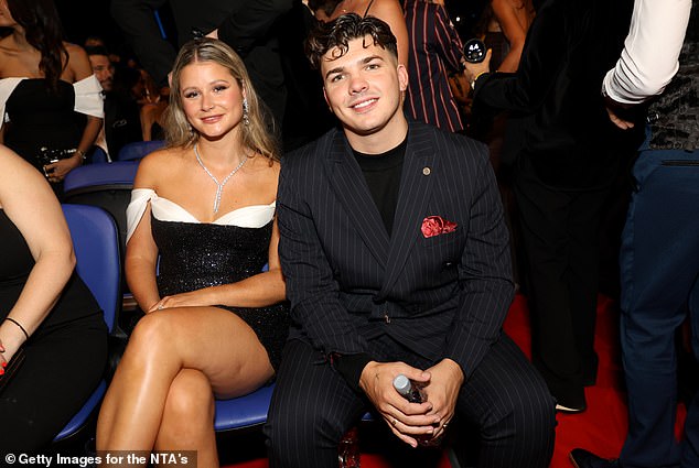 Harry won The Traitors' £95,000 prize after deceiving his fellow contestants, including Faithful runner-up Mollie Pierce (pictured at the NTAs after The Traitors won best reality competition)