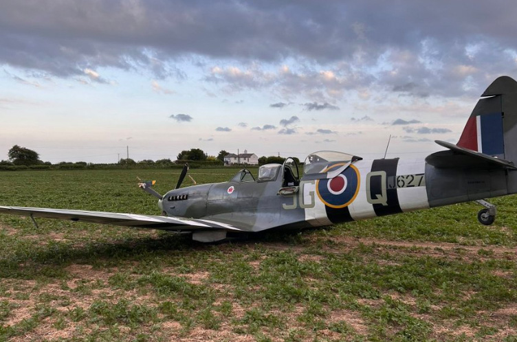 World War II Spitfire crash-landed in a field.