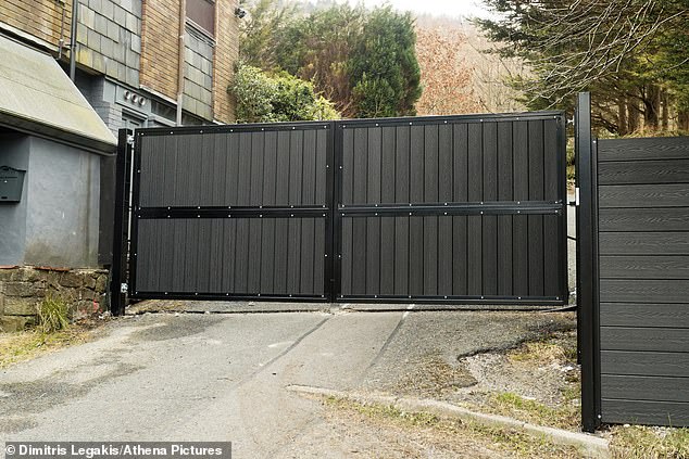 The imposing metal gates must now be torn down and access restored