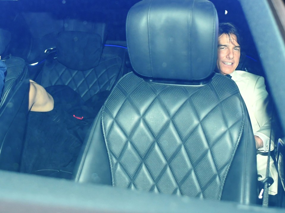 Tom Cruise and Ana de Armas leaving David Beckham's birthday party.