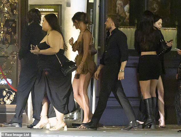 They were later seen heading back into the venue together