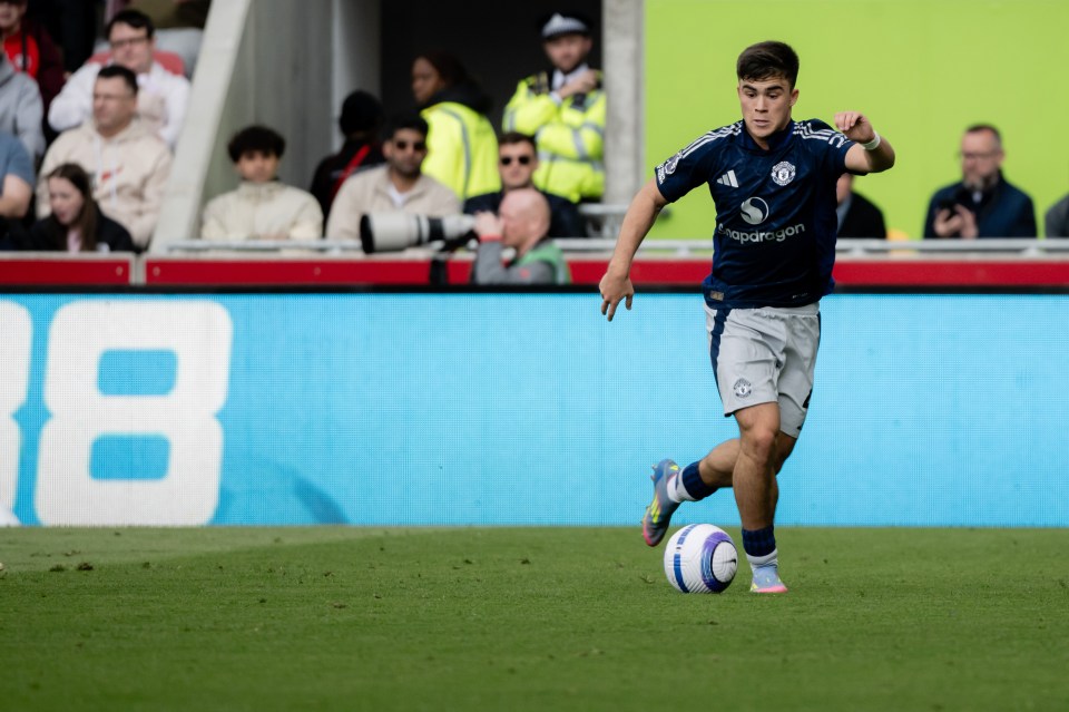 Harry Amass of Manchester United in action during a soccer match.