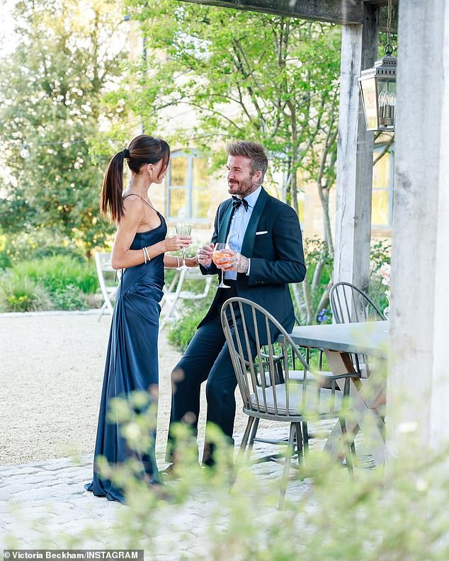 The photographer caught a sweet moment between Victoria and David