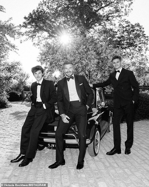 David stood proudly between his two youngest boys, Cruz (left) and Romeo (right)